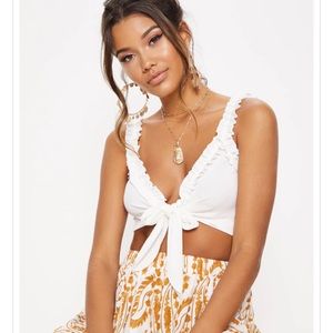 PrettyLittleThing White Ruffle Tie Front Crop Top